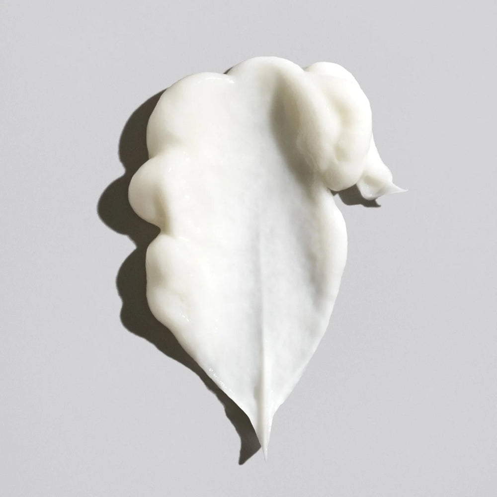 Oribe Signature Conditioner rich creamy texture for hydration and softness