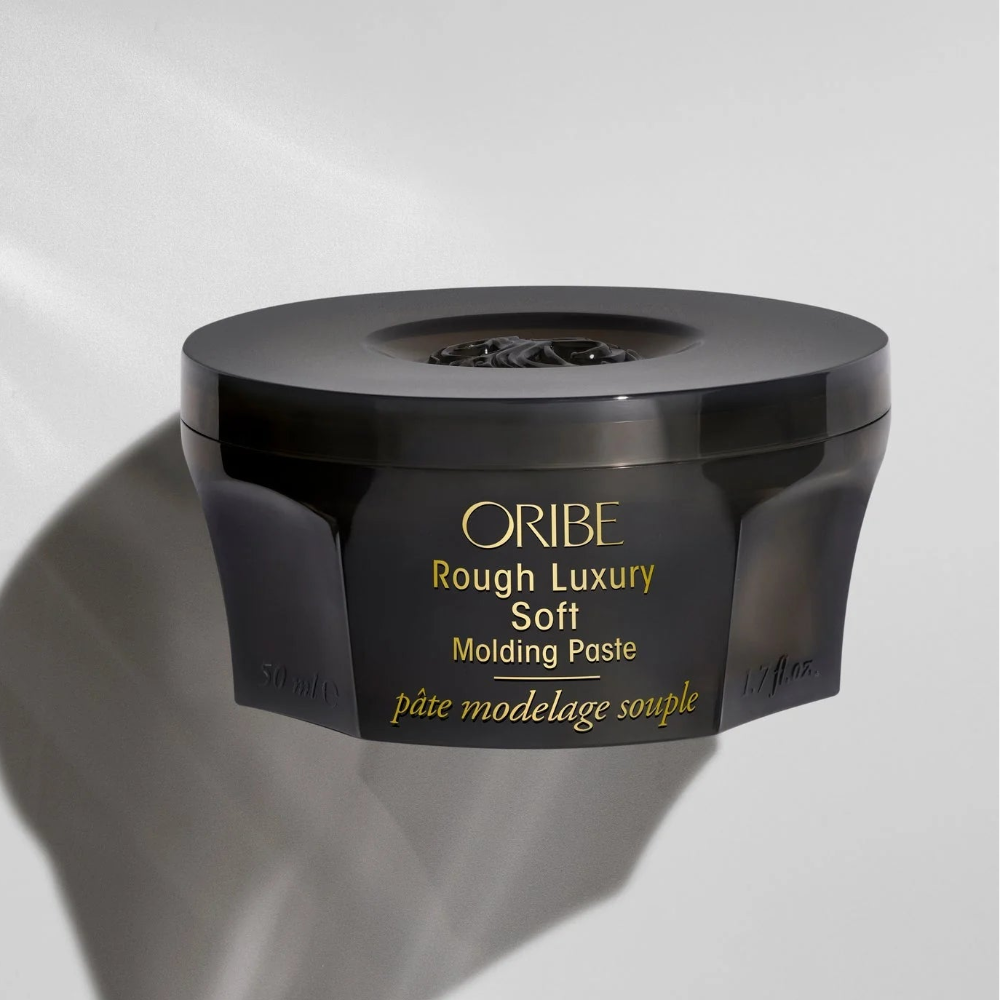 Oribe Rough Luxury Soft Molding Paste jar highlighting luxury styling product packaging