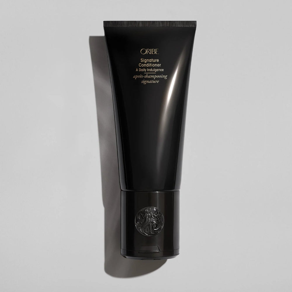 Oribe Signature Conditioner angled tube highlighting luxury hair care packaging