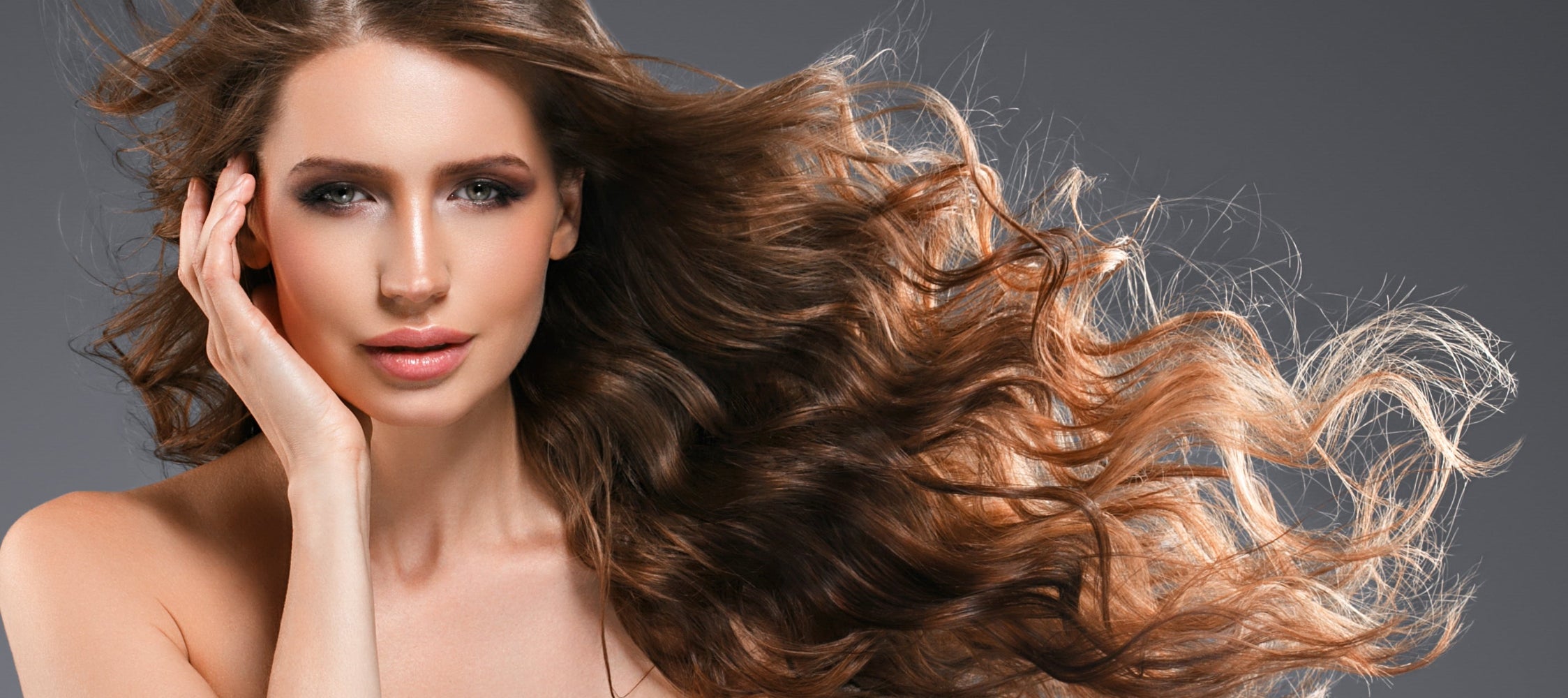 Long wavy hair extensions at Dolce Lusso Salon and Spa