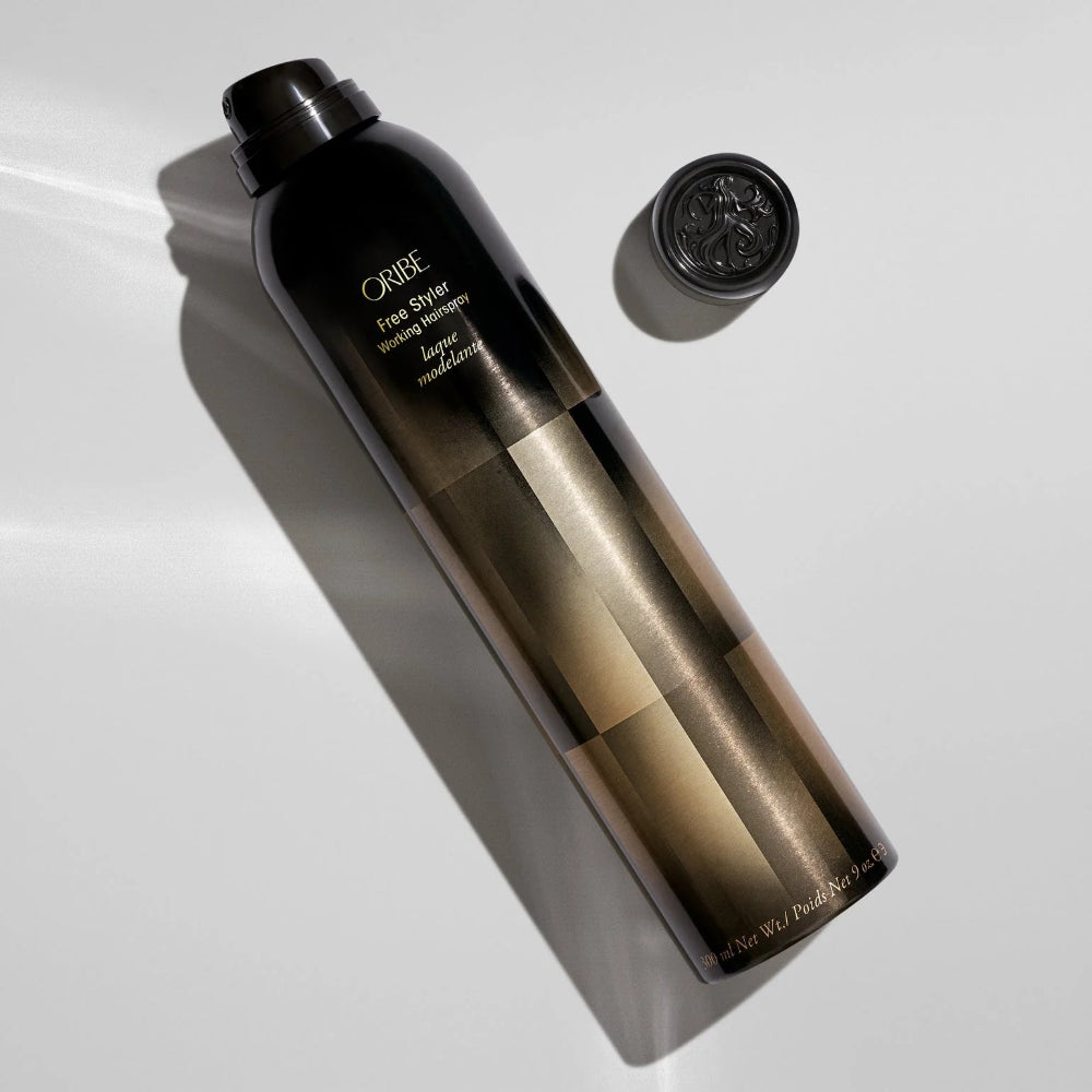 Oribe Free Styler working spray bottle showcasing professional styling product