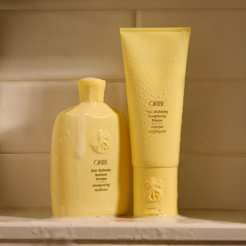 Oribe Hair Alchemy shampoo and conditioner system for hair repair and strength
