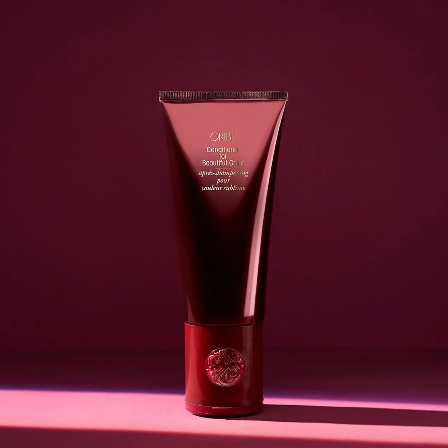 Oribe Conditioner for Beautiful Color in red tube for color protection, hydration, and shine