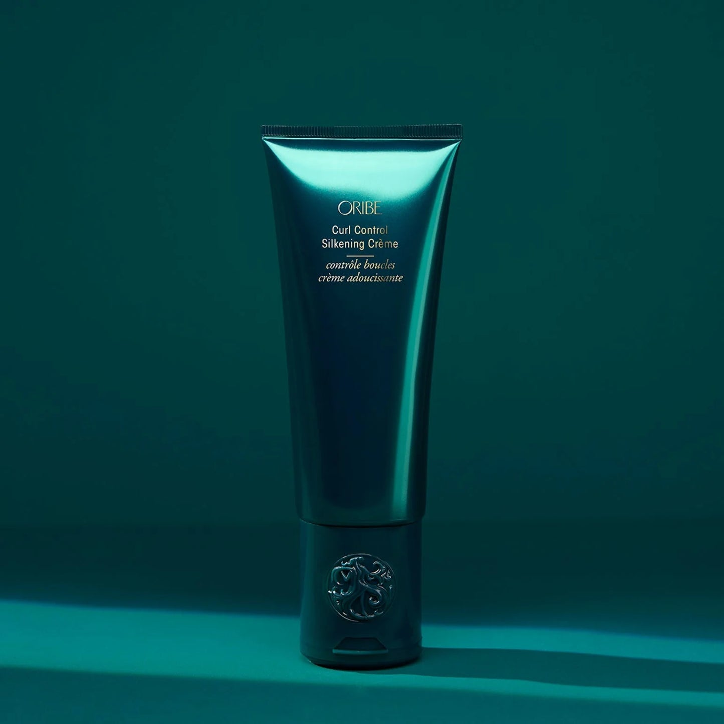 Oribe Curl Control Silkening Crème for smoothing, frizz control, and soft, touchable curl definition