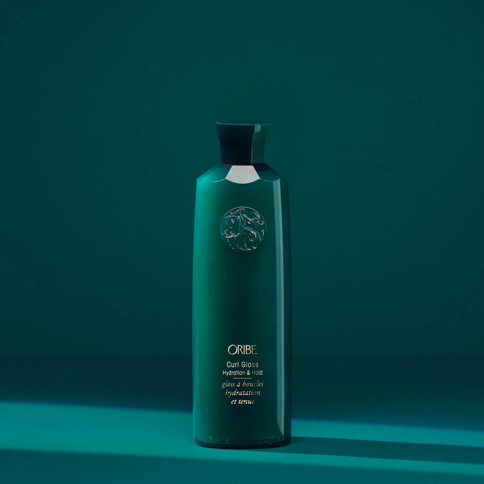 Oribe Curl Gloss hydrating styling gel for soft definition, frizz control, and enhanced natural curls