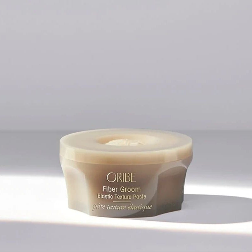 Oribe Fiber Groom Elastic Texture Paste for flexible hold separation and textured styling