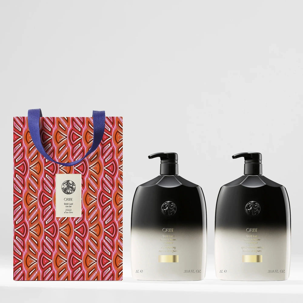 Oribe Gold Lust Repair & Restore Liter Shampoo and Conditioner with limited-edition red gift box packaging