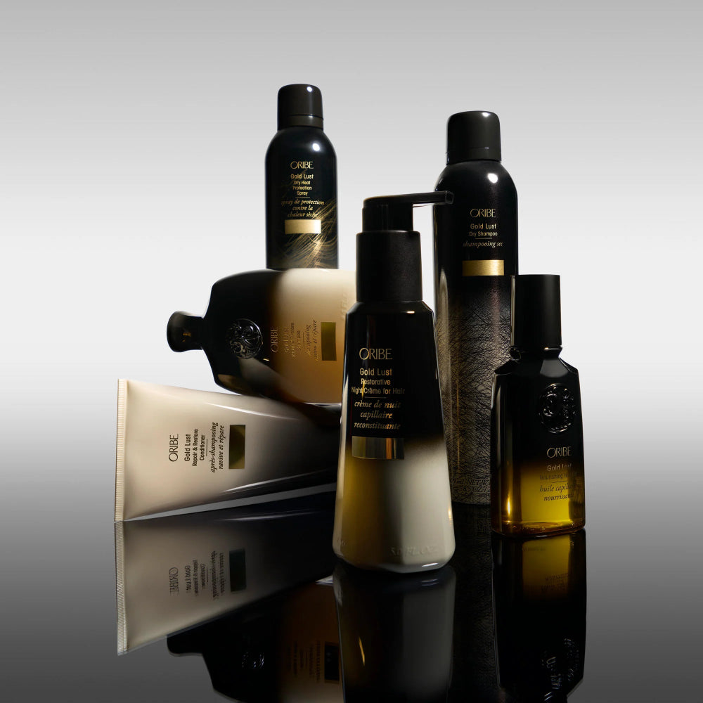 Oribe Gold Lust hair care collection featuring restorative night treatment for repair and shine