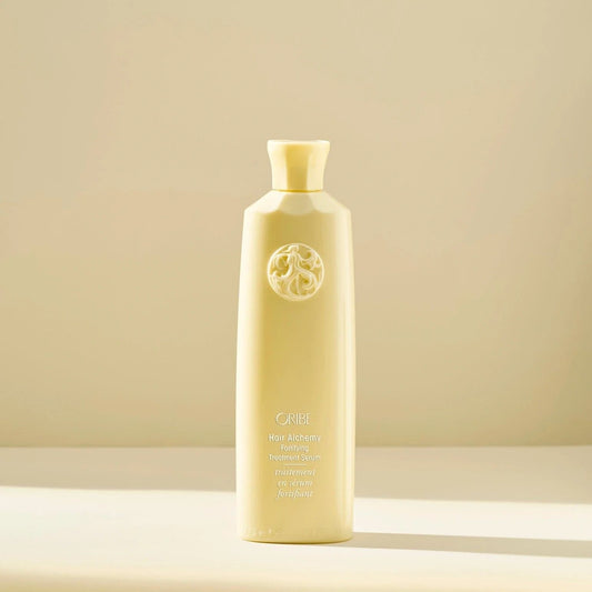 Oribe Hair Alchemy Fortifying Treatment Serum bottle for strengthening fragile hair and preventing breakage