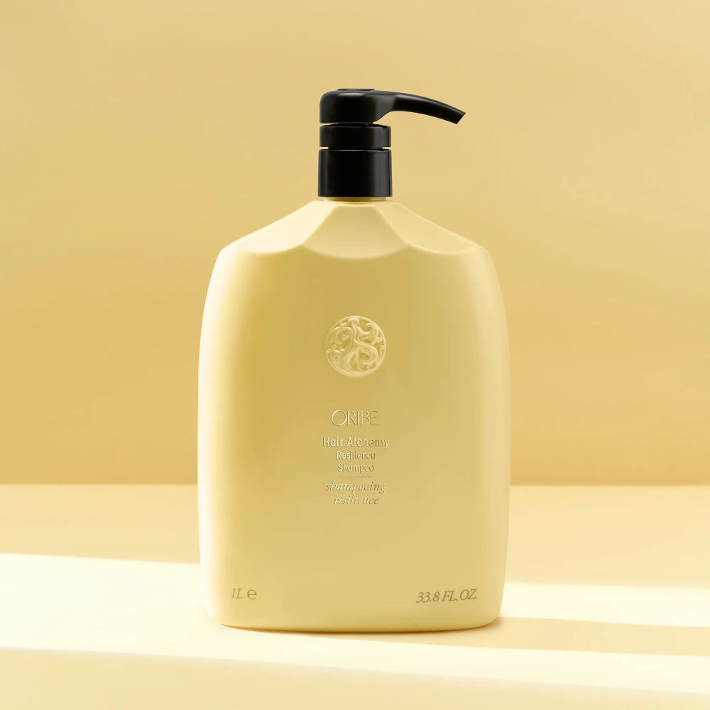 Oribe Hair Alchemy Resilience Shampoo liter bottle for gentle cleansing and repair