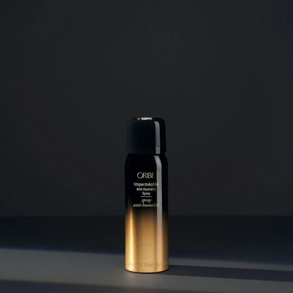 Professional anti-humidity hair spray by Oribe for smooth, frizz-free hair travel size