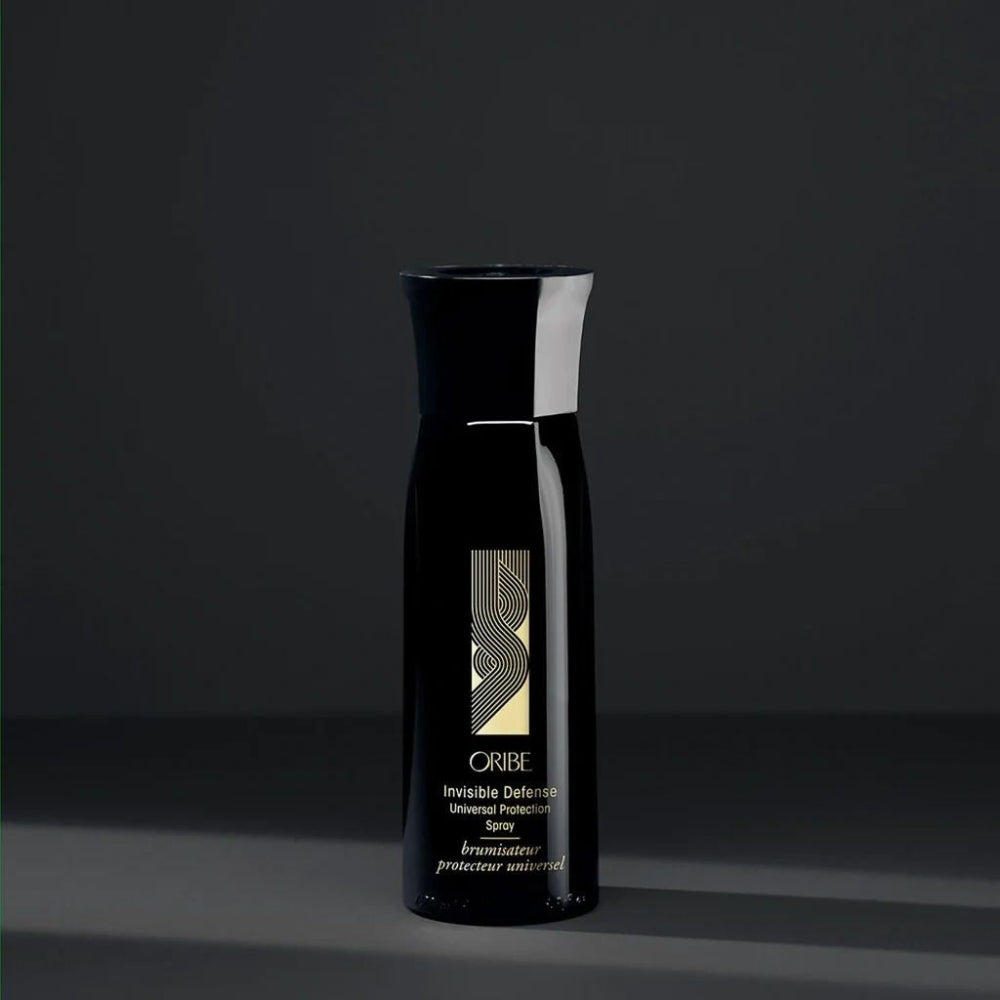 Oribe Invisible Defense Universal Protection Spray heat and UV protectant hair spray bottle