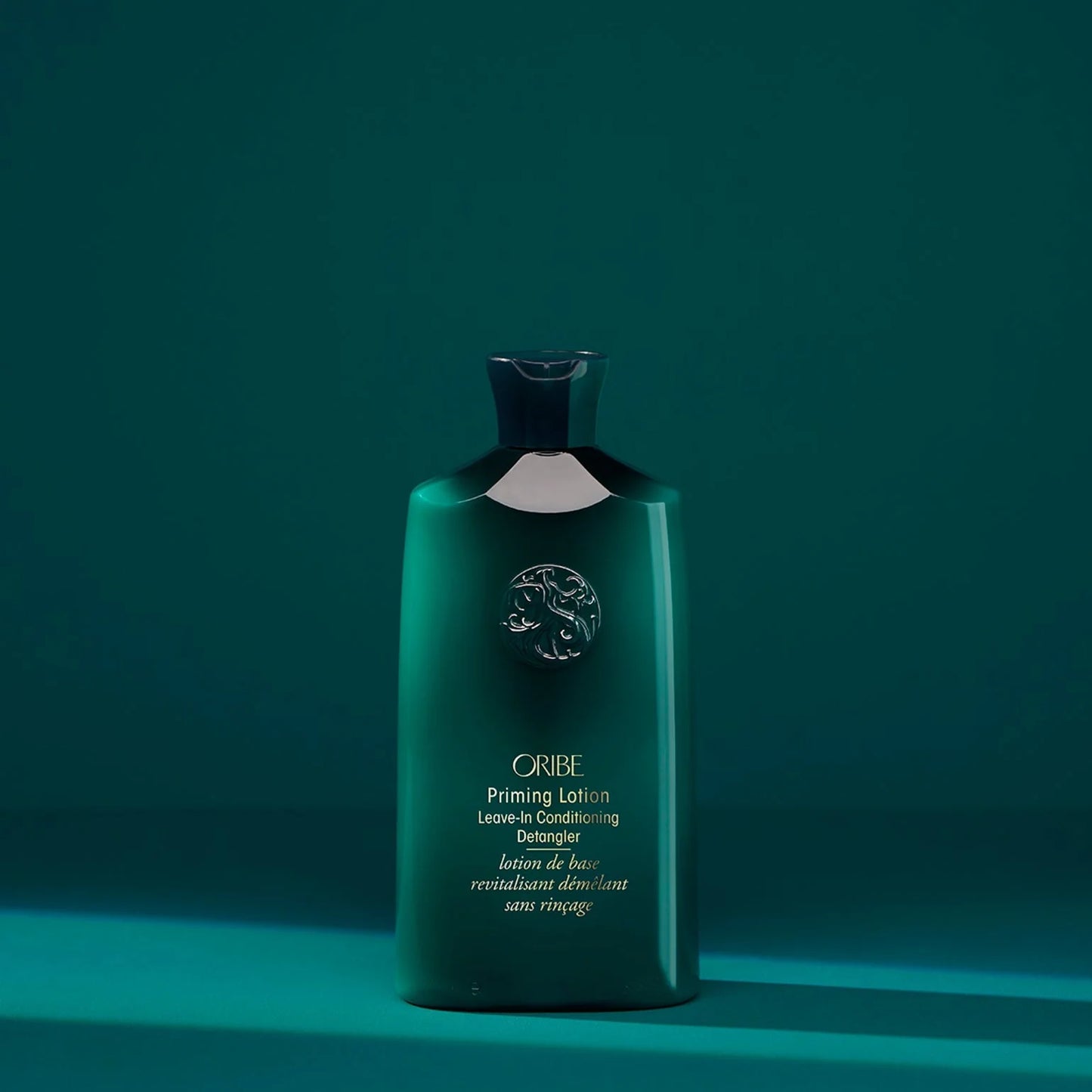 Oribe Priming Lotion Leave-In Conditioning Detangler for moisture, detangling, and curl prep