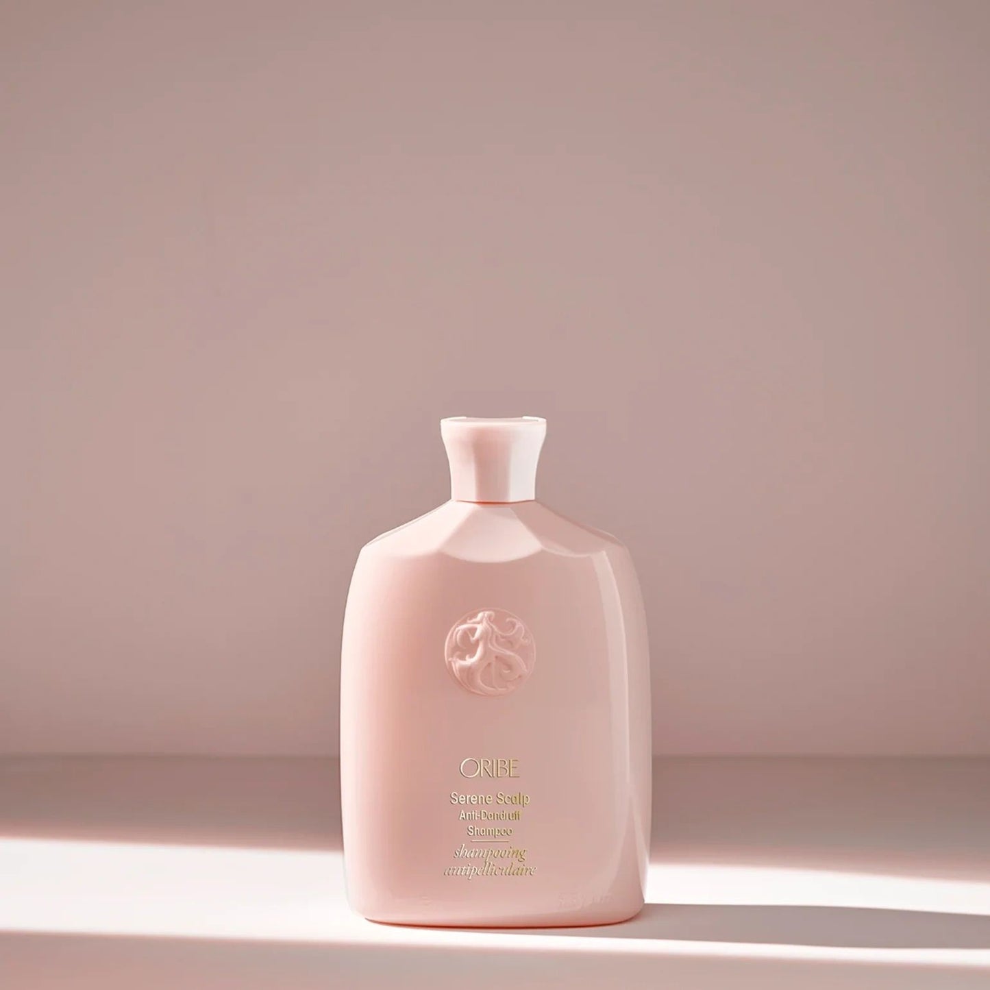 Oribe Serene Scalp Anti-Dandruff Shampoo bottle for flake control and balanced healthy scalp