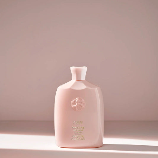 Oribe Serene Scalp Anti-Dandruff Shampoo bottle for flake control and balanced healthy scalp
