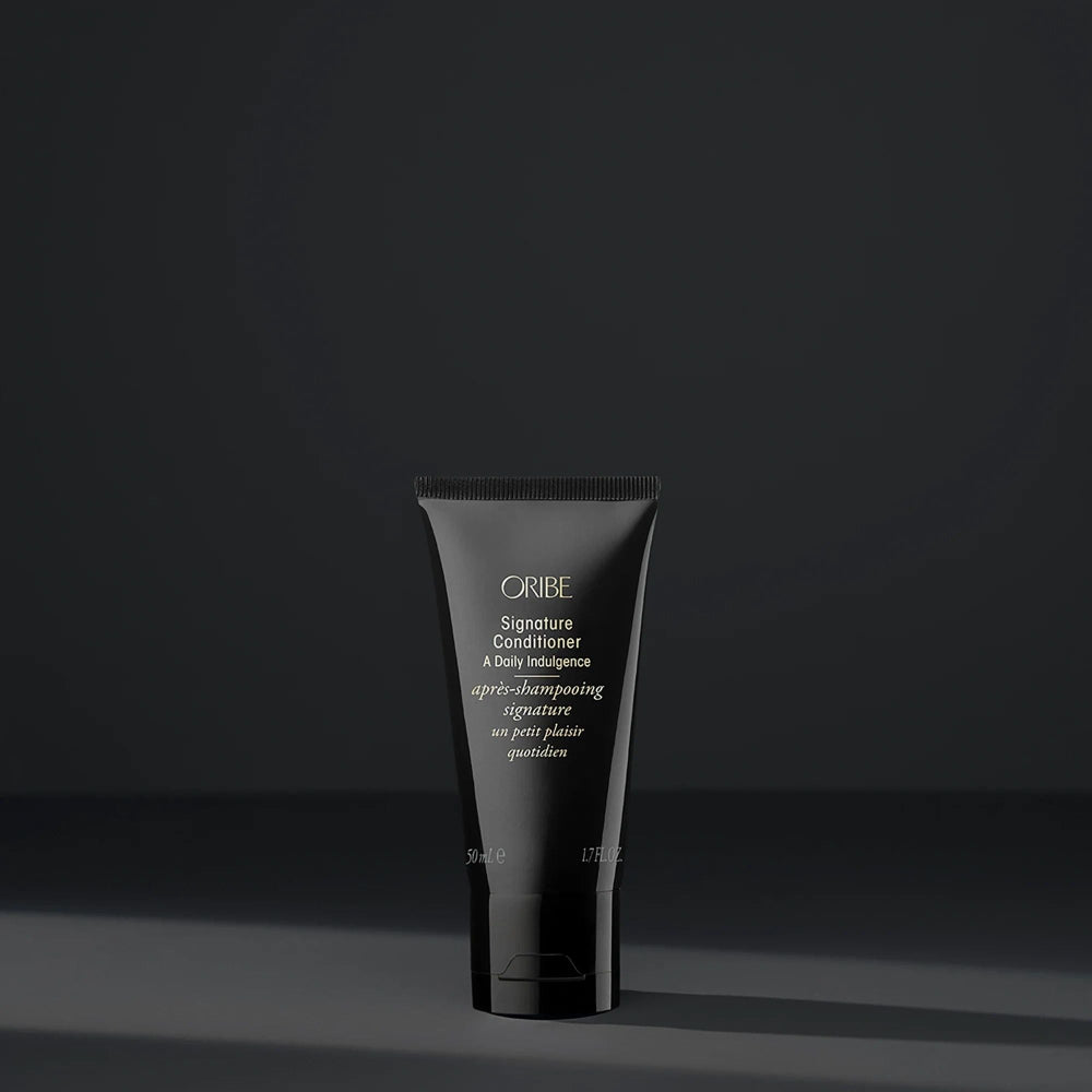 Oribe Signature Conditioner sleek black tube for daily hydration and detangling