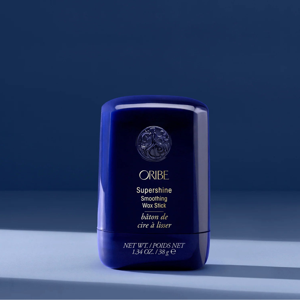 Oribe Supershine Smoothing Wax Stick for sleek hair flyaway control and high shine finish