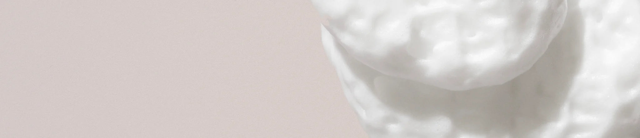 Close up of Oribe Volumizing Mousse