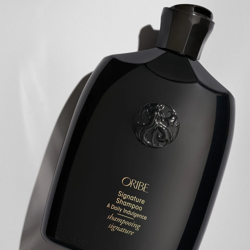 Oribe Signature Shampoo angled bottle highlighting luxury hair care packaging