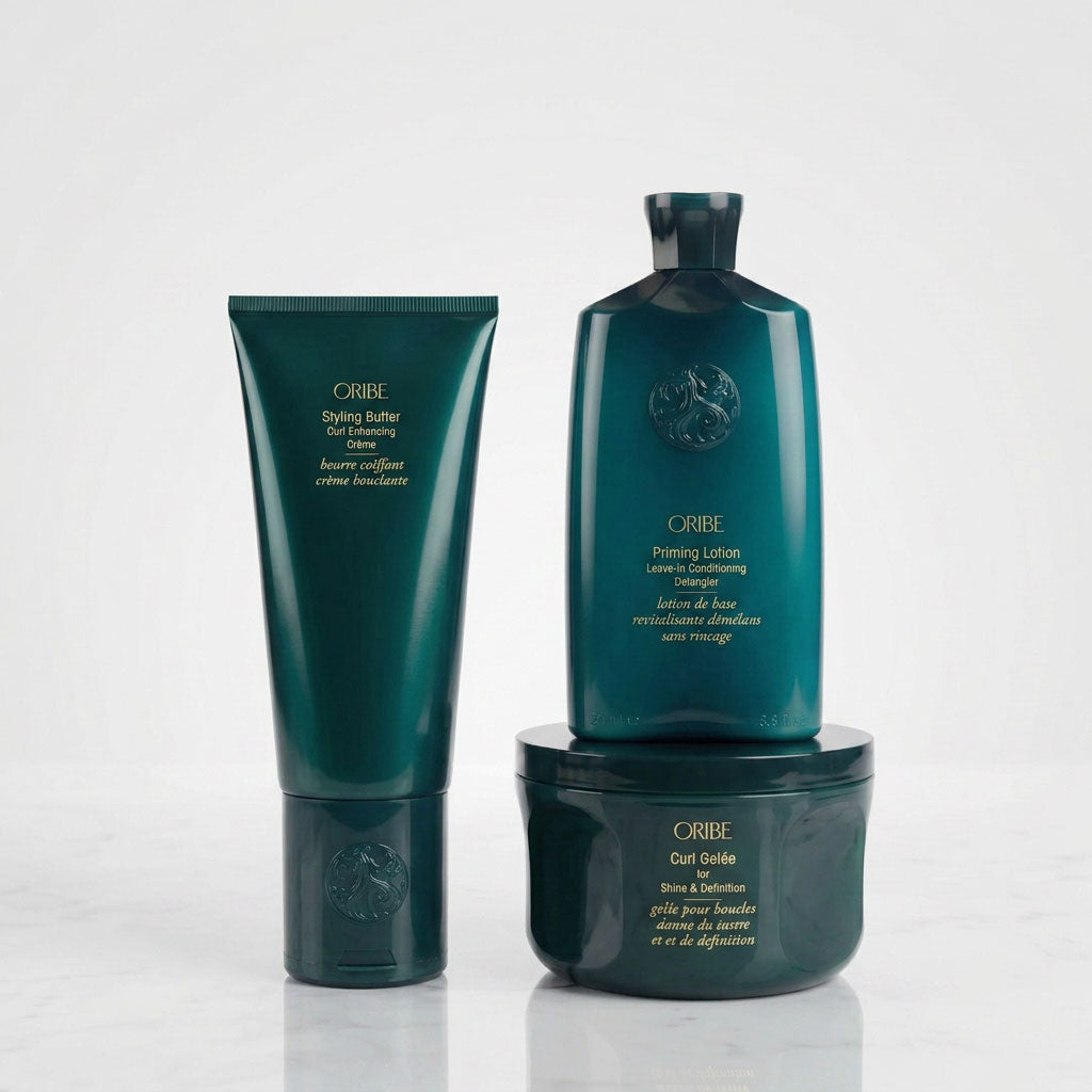 Oribe curl trio including Curl Butter, Curl Gelée, and Priming Lotion for moisture, hold, and curl definition