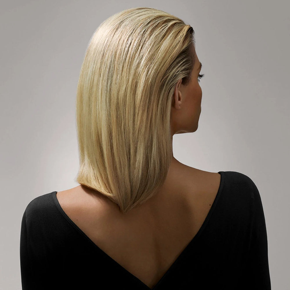 Smooth sleek blonde hair styled with Oribe Crème for Style for frizz control and shine
