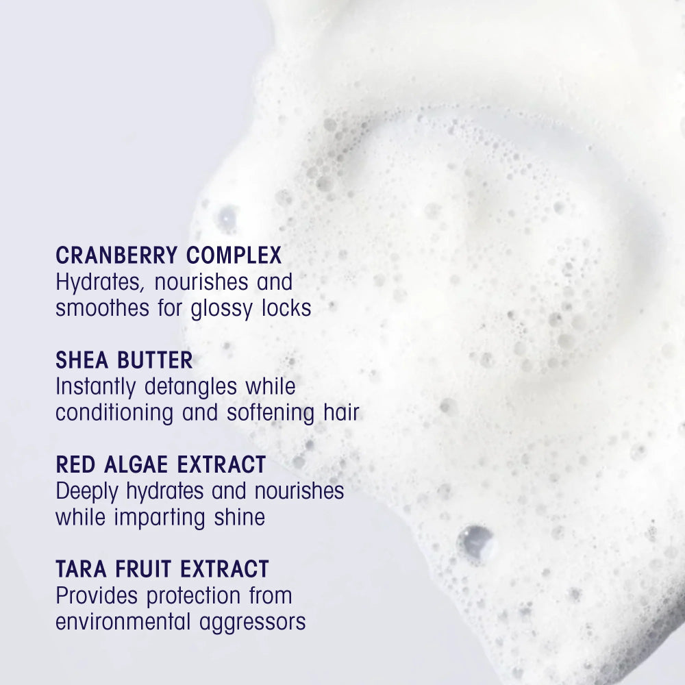 Oribe Run-Through shampoo ingredients showing cranberry complex, shea butter, and red algae for hydration and shine