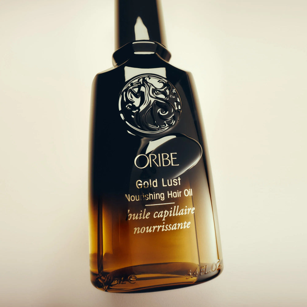 Oribe Gold Lust hair oil bottle showcasing lightweight nourishing formula