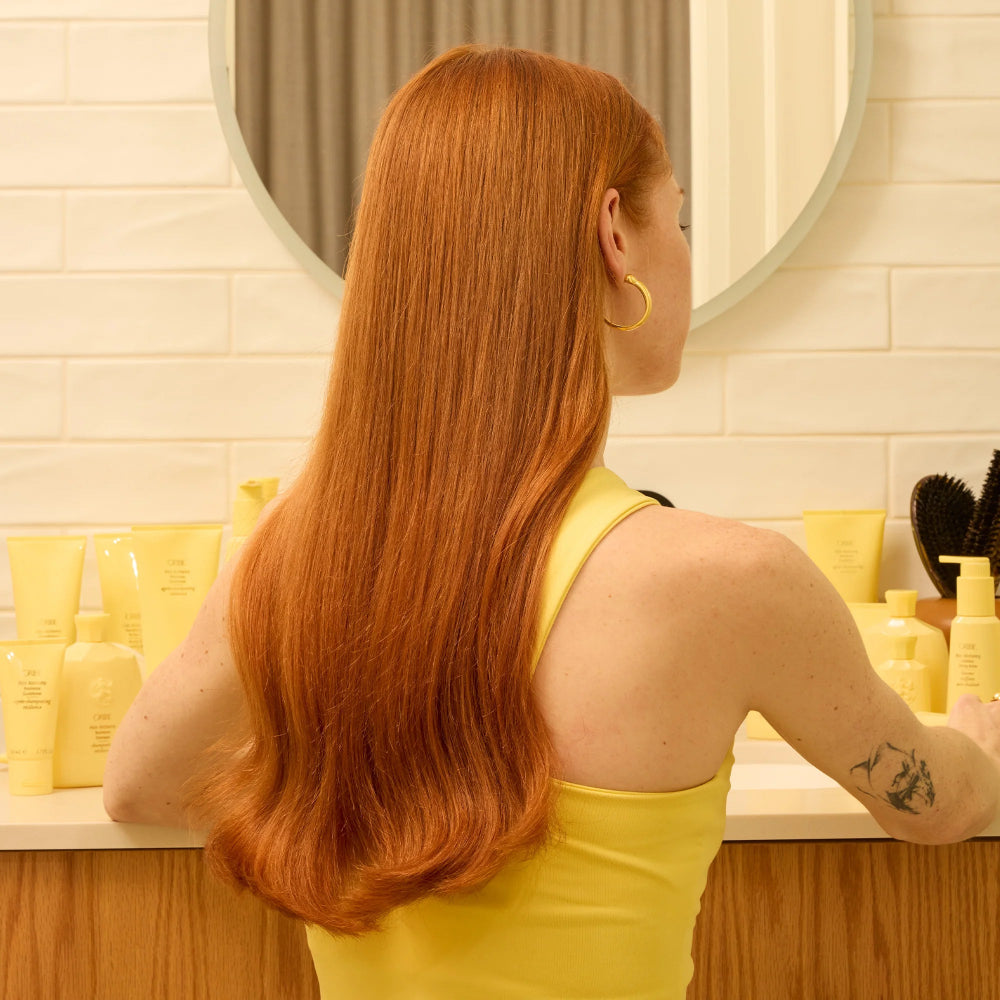 smooth healthy long hair results after using Oribe Hair Alchemy strengthening shampoo and conditioner