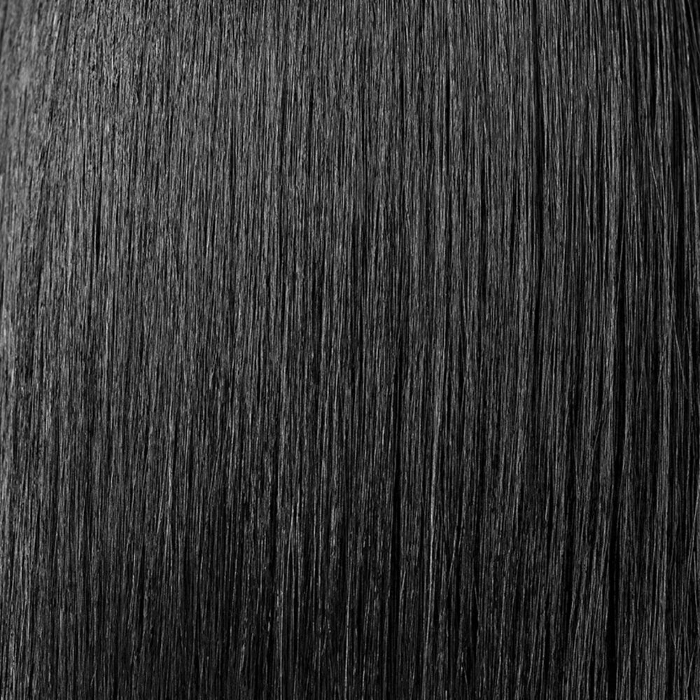 Smooth sleek hair texture showing results of Oribe Royal Blowout heat styling spray