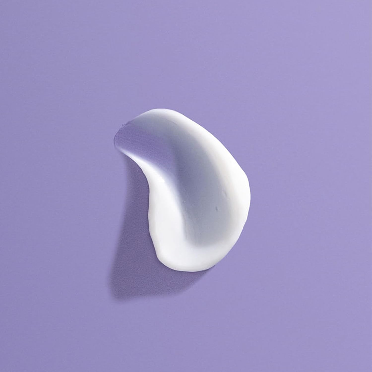 creamy conditioner texture for smoothing frizzy hair and improving softness manageability and shine