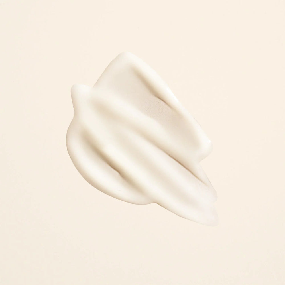 Oribe Matte Waves Texture Lotion creamy formula for soft hold and natural movement