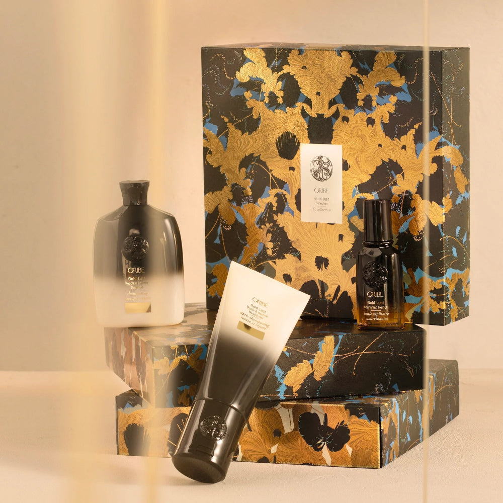 Oribe Gold Lust Repair and Restore haircare collection with luxury gift packaging