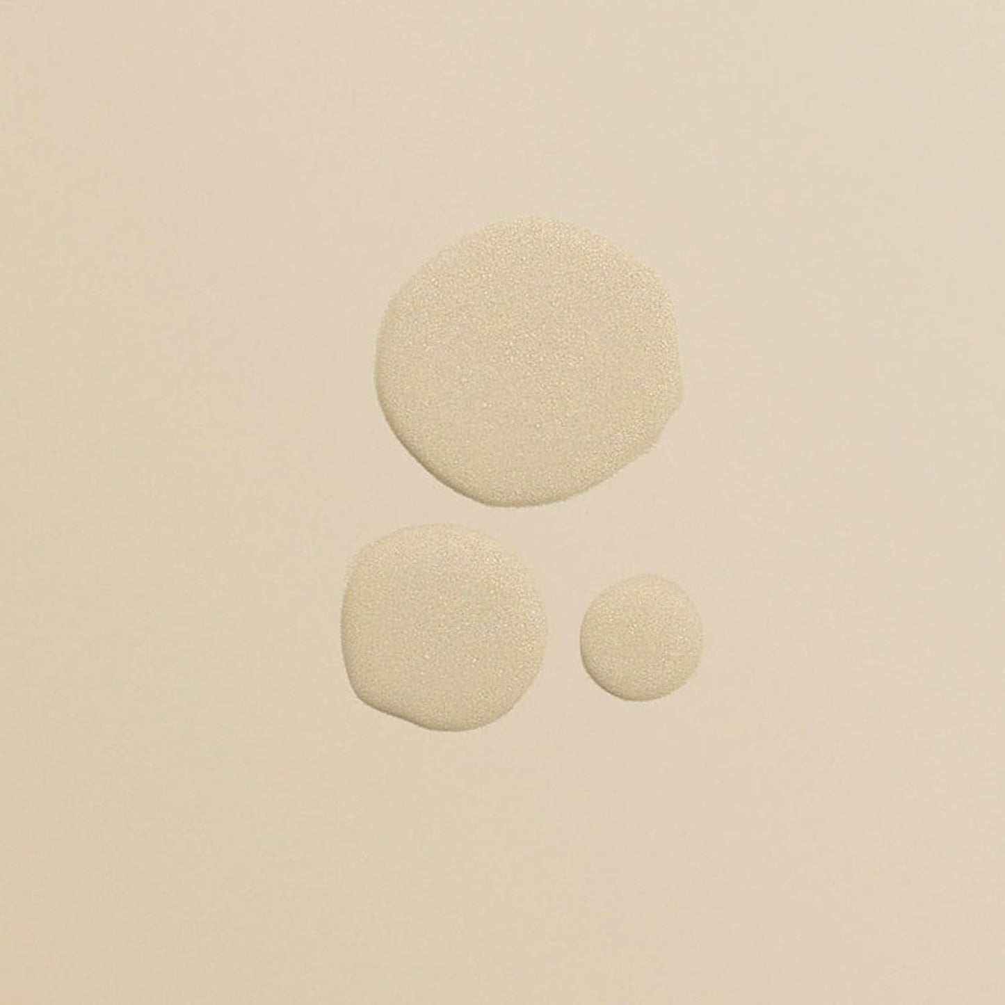 lightweight serum spray droplets showing fine mist texture for repairing and smoothing damaged hair