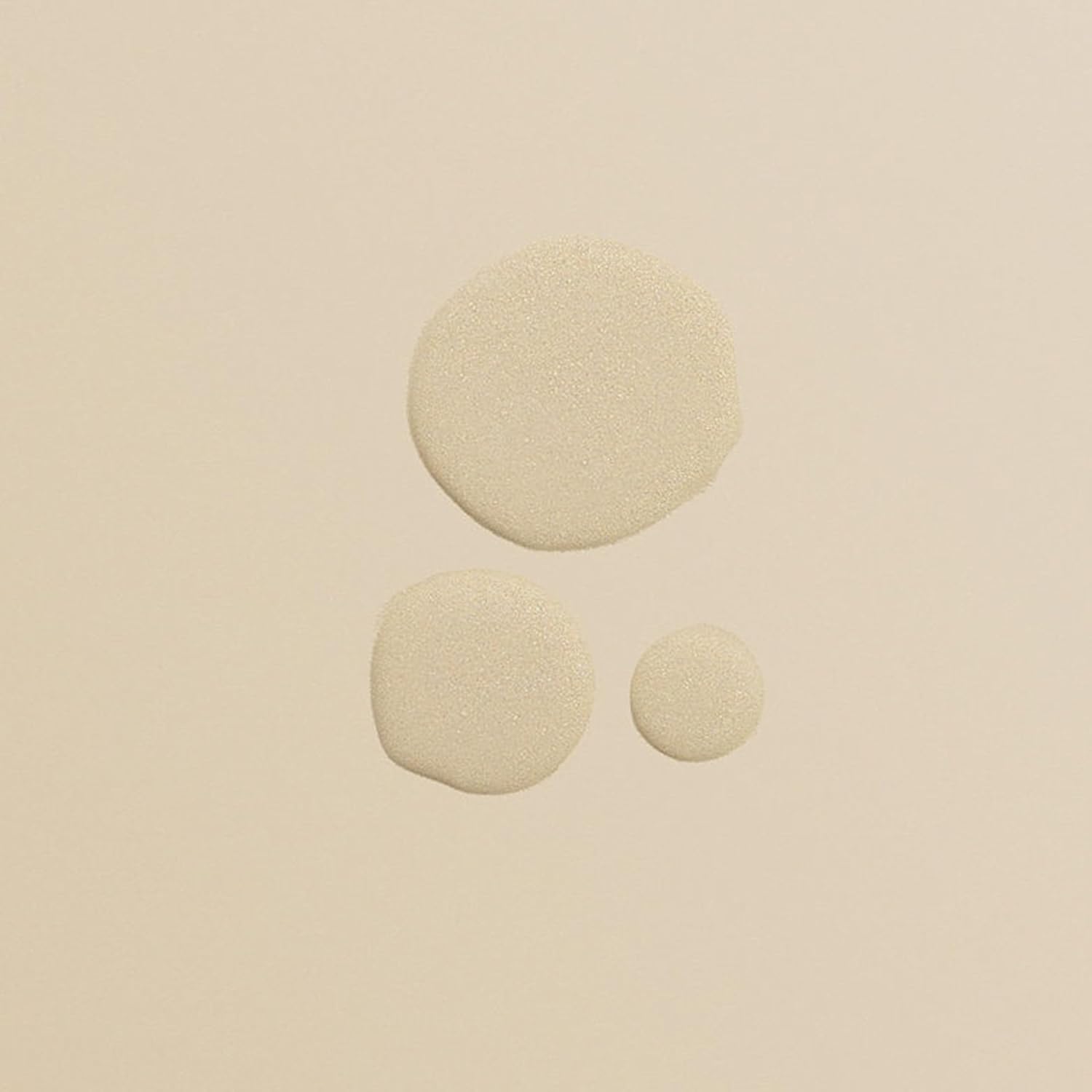 lightweight serum spray droplets showing fine mist texture for repairing and smoothing damaged hair