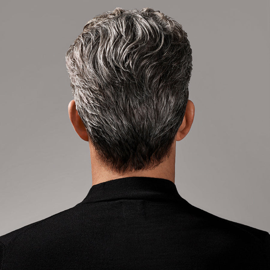 Textured short hairstyle styled with Oribe Rough Luxury molding paste for definition