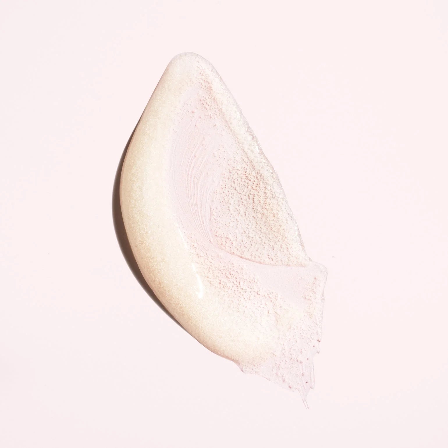 exfoliating scalp scrub texture showing gentle physical exfoliation for buildup removal