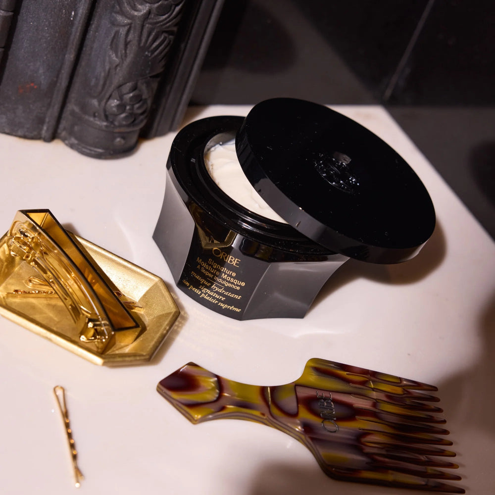 Oribe luxury hair care products including moisture masque for deep conditioning and softness