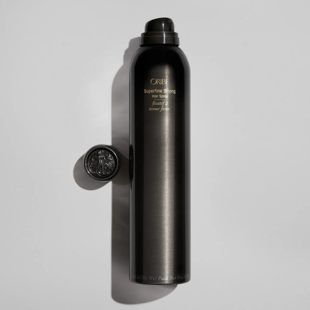 Oribe Superfine Strong Hair Spray bottle highlighting luxury salon styling product
