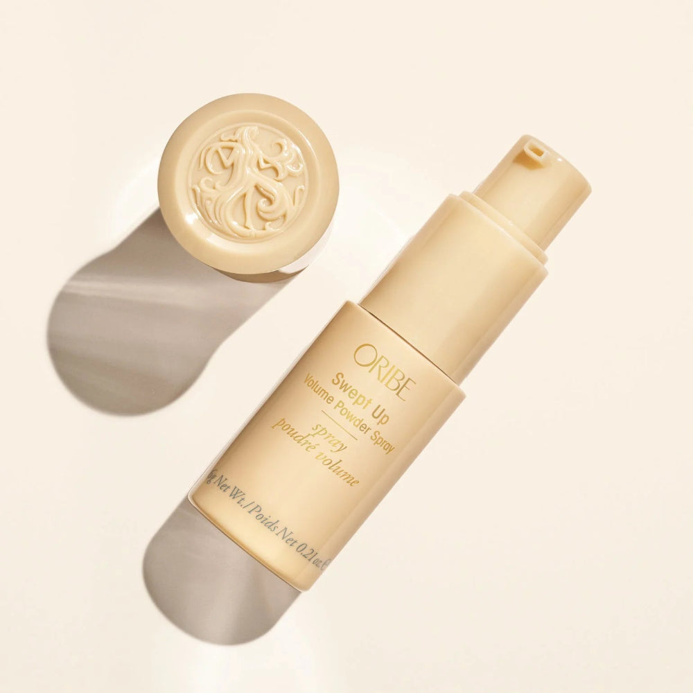 Oribe Swept Up volumizing powder spray showcasing lightweight styling product